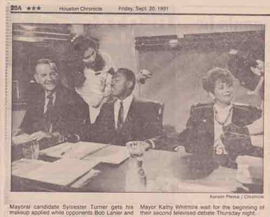 A Houston Mayoral Debate Feature covered by the Houston Chronicle, Makeup Artist Cinthia Moore is pictured.